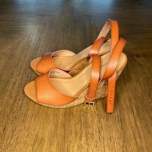 Beautiful never worn wedge open toe sandals with straps and gold accents.